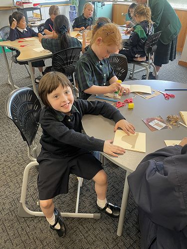 Years 0-3 making their creations.